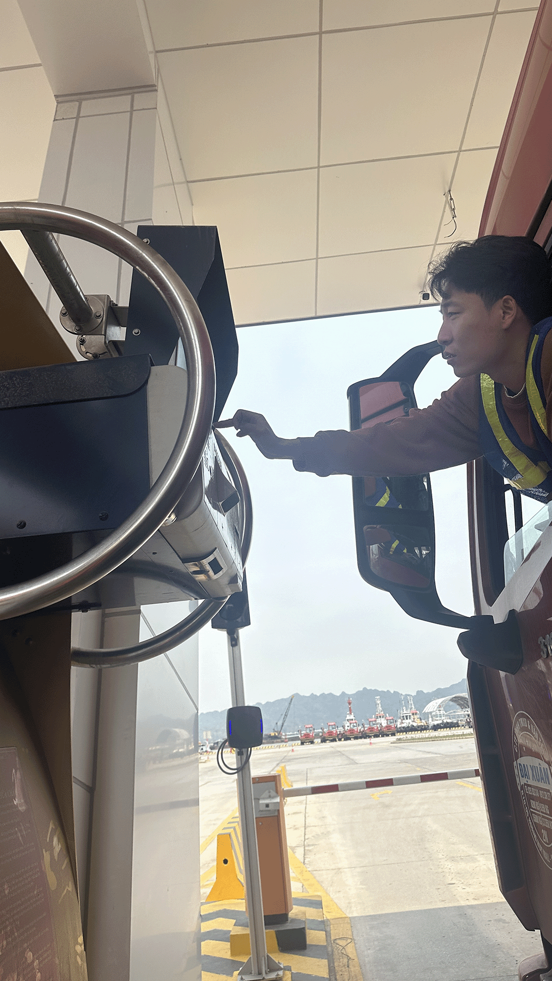 Truck driver using Camco Technologies' gate kiosk
